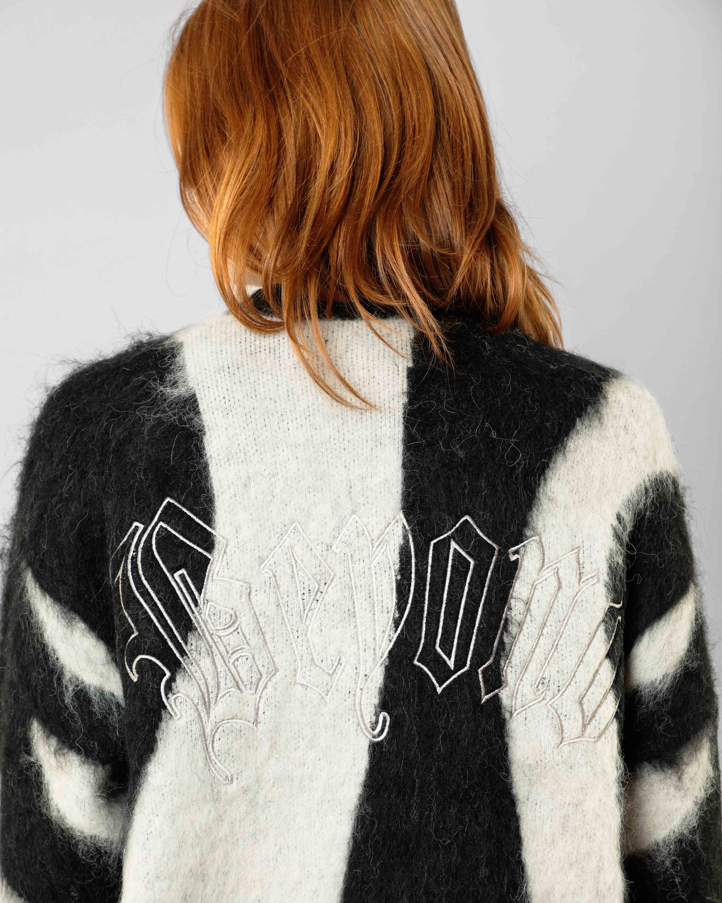 Fluffy Sweater | Beyond Medals